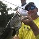 Doug Miller holding a bass